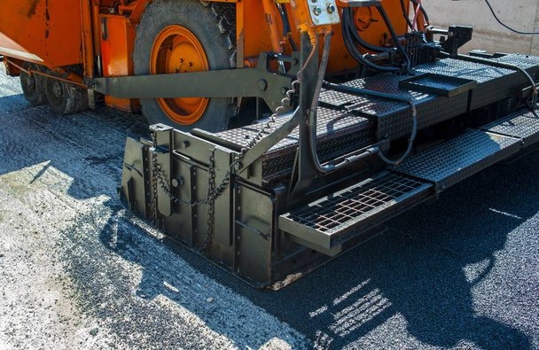 close-up details of industrial machinery working with asphalt - Photo, Image