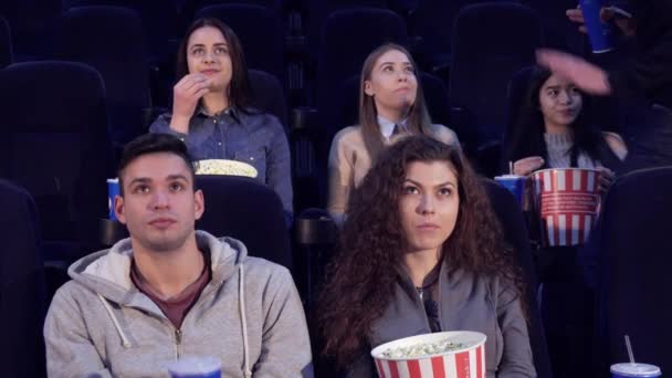Man takes his place at the movie theater - Footage, Video