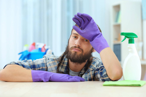 Funny young man tired of cleaning flat - Φωτογραφία, εικόνα