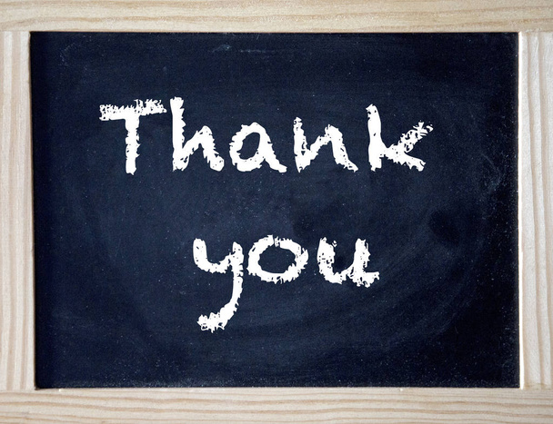 Thank You written on black chalk board - Foto, Imagen