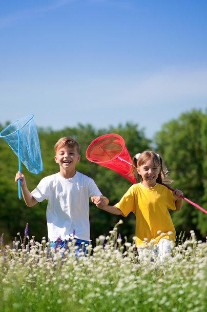 Happy children on meadow - 写真・画像