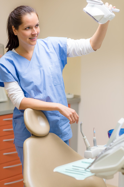 Female dentist prepare patient chair at surgery - Φωτογραφία, εικόνα