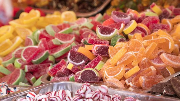 Süßwarenladen bunte Süßigkeiten Hintergrund - Foto, Bild