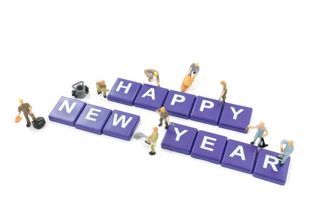 Miniatura lavoratore team building parola felice anno nuovo
  - Foto, immagini
