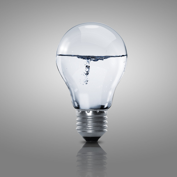 Electric light bulb with clean water - Fotoğraf, Görsel