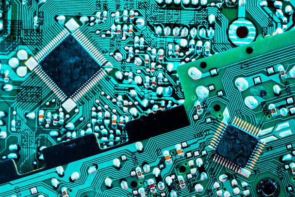 deux circuits imprimés couleur turquoise composition diagonale
 - Photo, image
