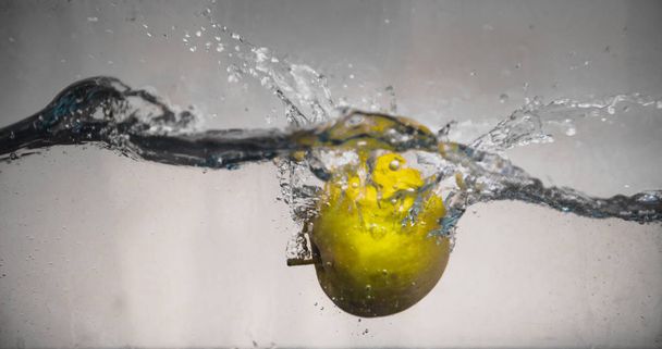 Apple dip in aquarium - Photo, Image