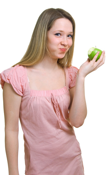 Girl with a green apple - Photo, Image