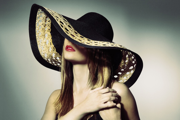 Attractive elegant sexy woman with black hat - Фото, изображение
