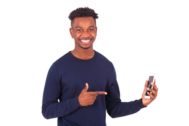 Young African American man pointing his  smartphone screen - Bla - Фото, зображення
