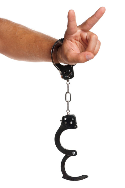 Hand with handcuffs - Photo, Image