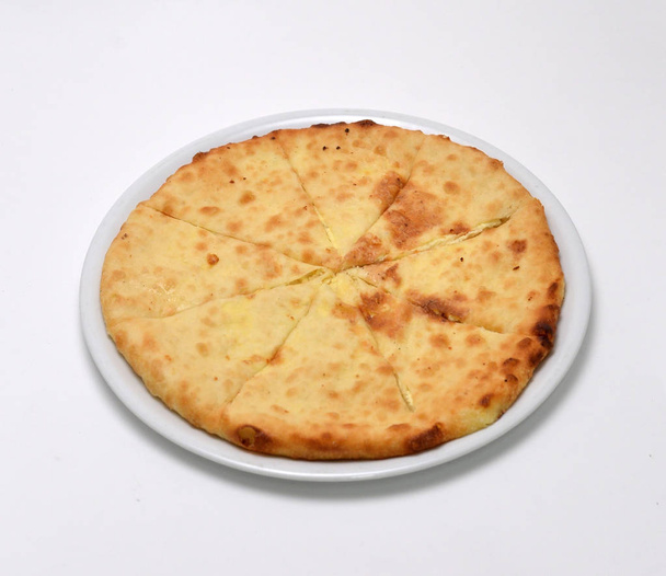 Megruli Khachapuri, filled with cheese and topped with cheese, Georgia - Photo, Image