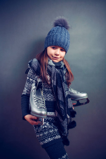 Little girl with skates isolated on background - Photo, image