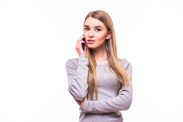 Blonde girl speak on phone on white - Фото, зображення