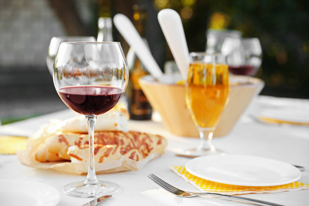 Plate, fork and glass of red wine - Foto, Imagen