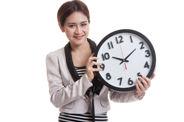 Young Asian business woman with a clock. - Fotografie, Obrázek