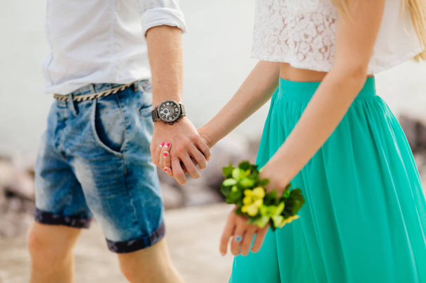 lovely couple holding hands together - Фото, изображение