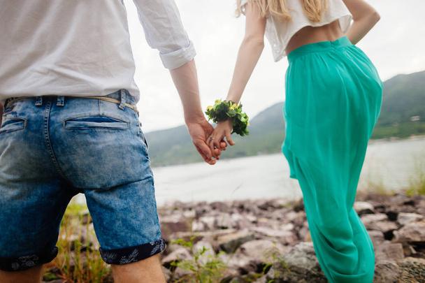lovely couple holding hands together - 写真・画像