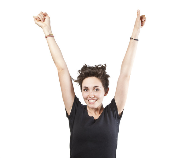 Feliz mujer hermosa ganadora con los brazos arriba aislado sobre fondo blanco
 - Foto, Imagen