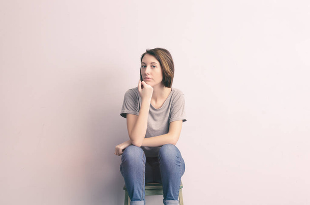  girl sitting on a stool  - Foto, Imagem