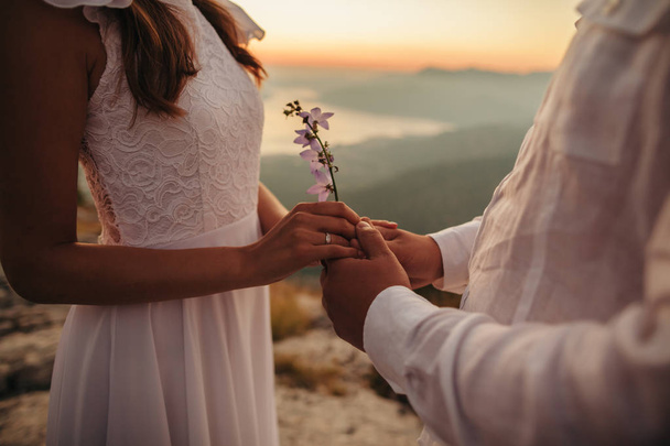 lovely couple holding hands together - Zdjęcie, obraz