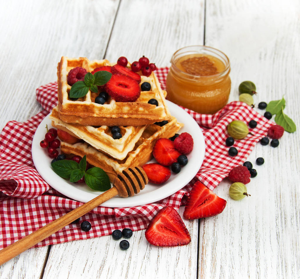 waffles with fresh berries - Fotó, kép