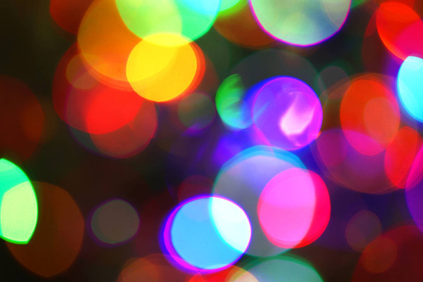 Pontos de luz multicoloridos. Desfocado abstrato luzes férias fundo
 - Foto, Imagem