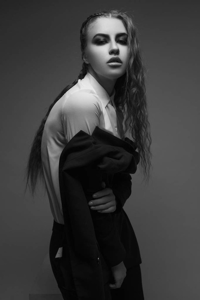 Fashion girl posing. Black and white photography. - Фото, зображення