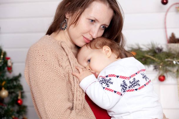 Mom breast feeding baby girl - Фото, зображення