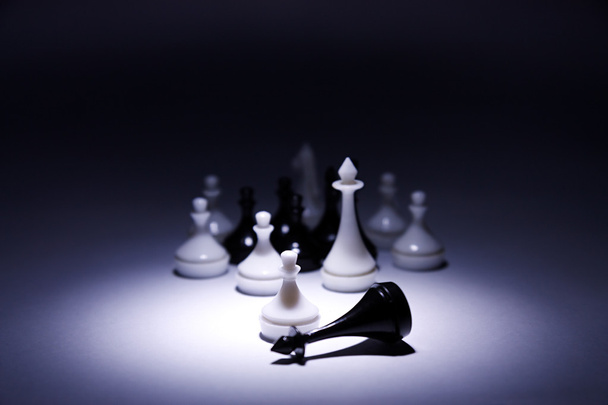 White pawn with army defeats black king - Foto, Imagen