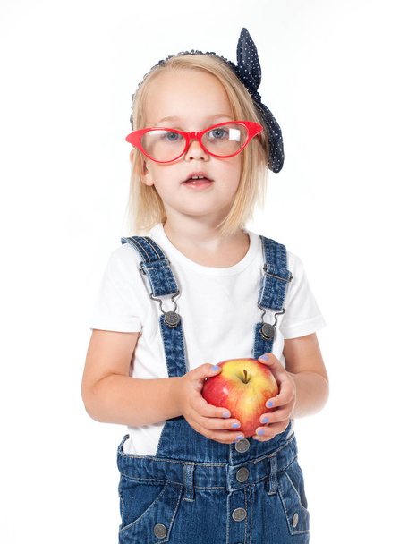  дівчина - студент, що тримає яблуко
 - Фото, зображення
