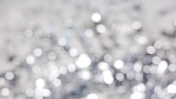 rozmazané stříbrné vánoční světla bokeh - Záběry, video