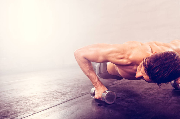 Man doing push-up exercise  - Valokuva, kuva