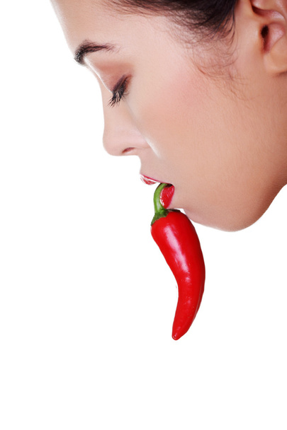 Beautiful woman lips with hot paprika - Zdjęcie, obraz