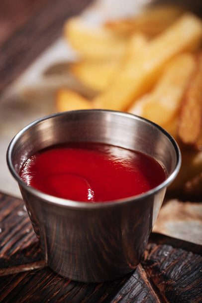 Close up of sauce being served with French fries - Fotoğraf, Görsel