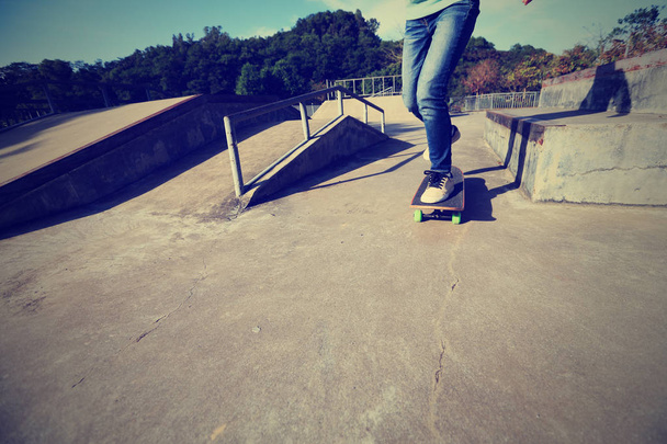 skateboarder legs practicing outdoors - 写真・画像