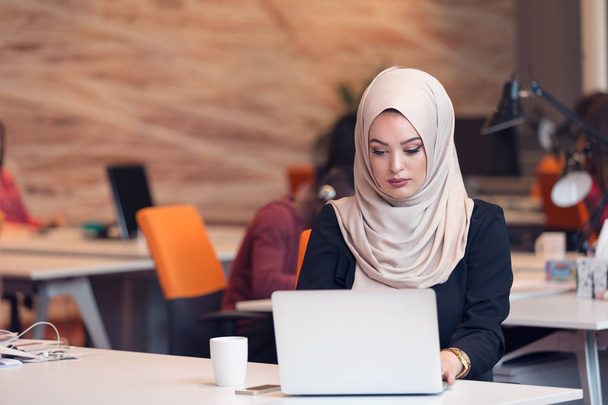 Arabic business woman working in office. - 写真・画像