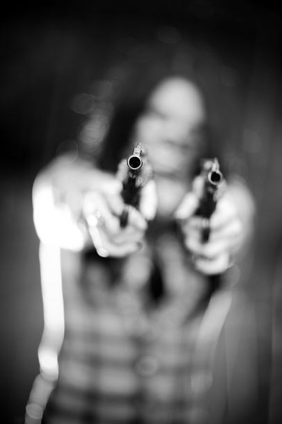 Woman with gun - Фото, изображение