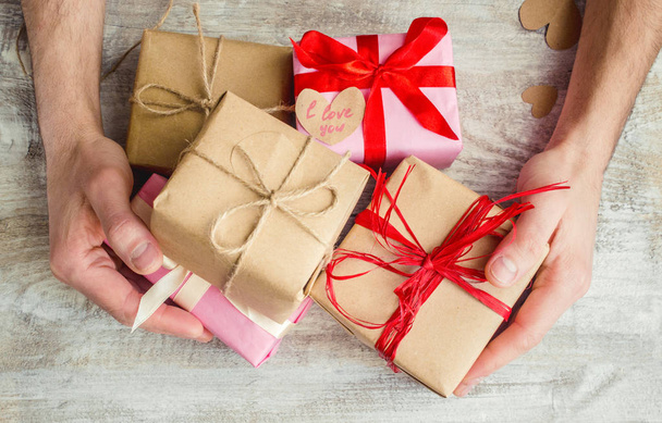 Gifts for the holiday in a beautiful package. Selective focus. - Photo, image