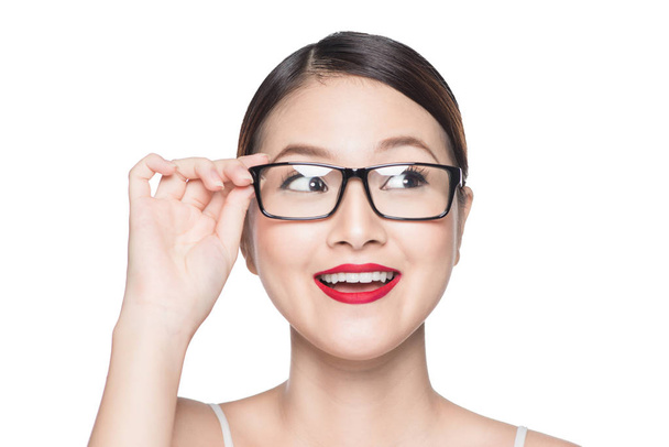 Beauty asian model girl with perfect skin wearing glasses, isola - Fotó, kép