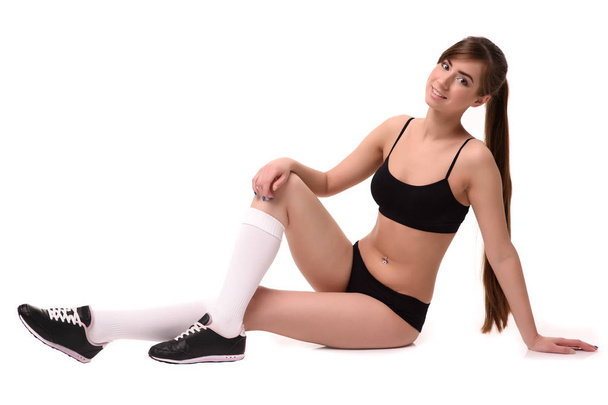 beautiful fitness woman in black underwear. on a white background - Foto, imagen