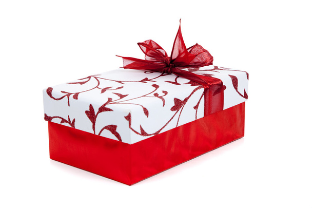 Red and white wrapped Christmas present on white - Foto, Imagem