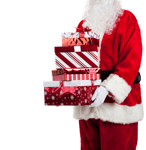 Santa Claus giving Christmas presents - Fotoğraf, Görsel