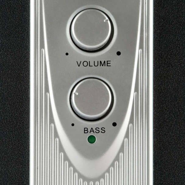 Volume e baixo alto-falante controles close-up
 - Foto, Imagem