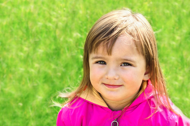 Cute little girl on the meadow - Valokuva, kuva