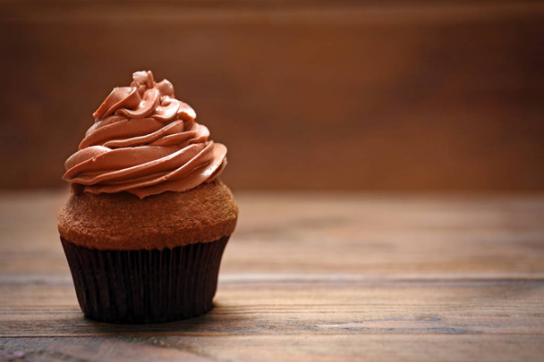 Tasty chocolate cupcake - Фото, зображення