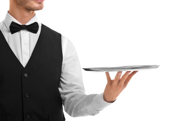 Waiter holding empty silver tray  - Φωτογραφία, εικόνα