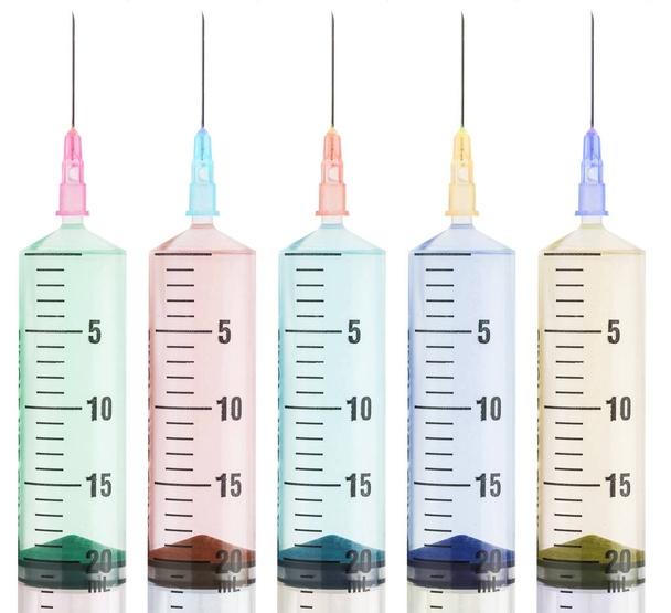 seringas coloridas sobre fundo branco
 - Foto, Imagem