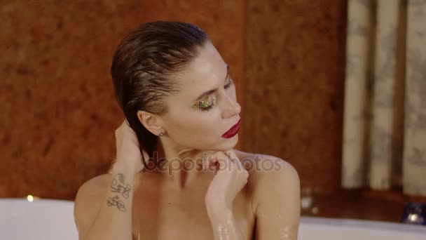 sensual woman with bright cosmetics at bath. - Πλάνα, βίντεο