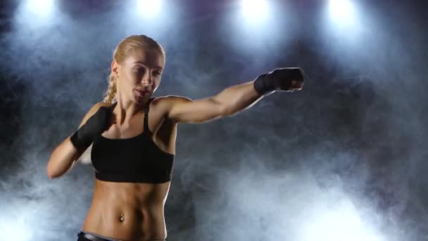 Training before the fight athletic girl boxer - Filmmaterial, Video